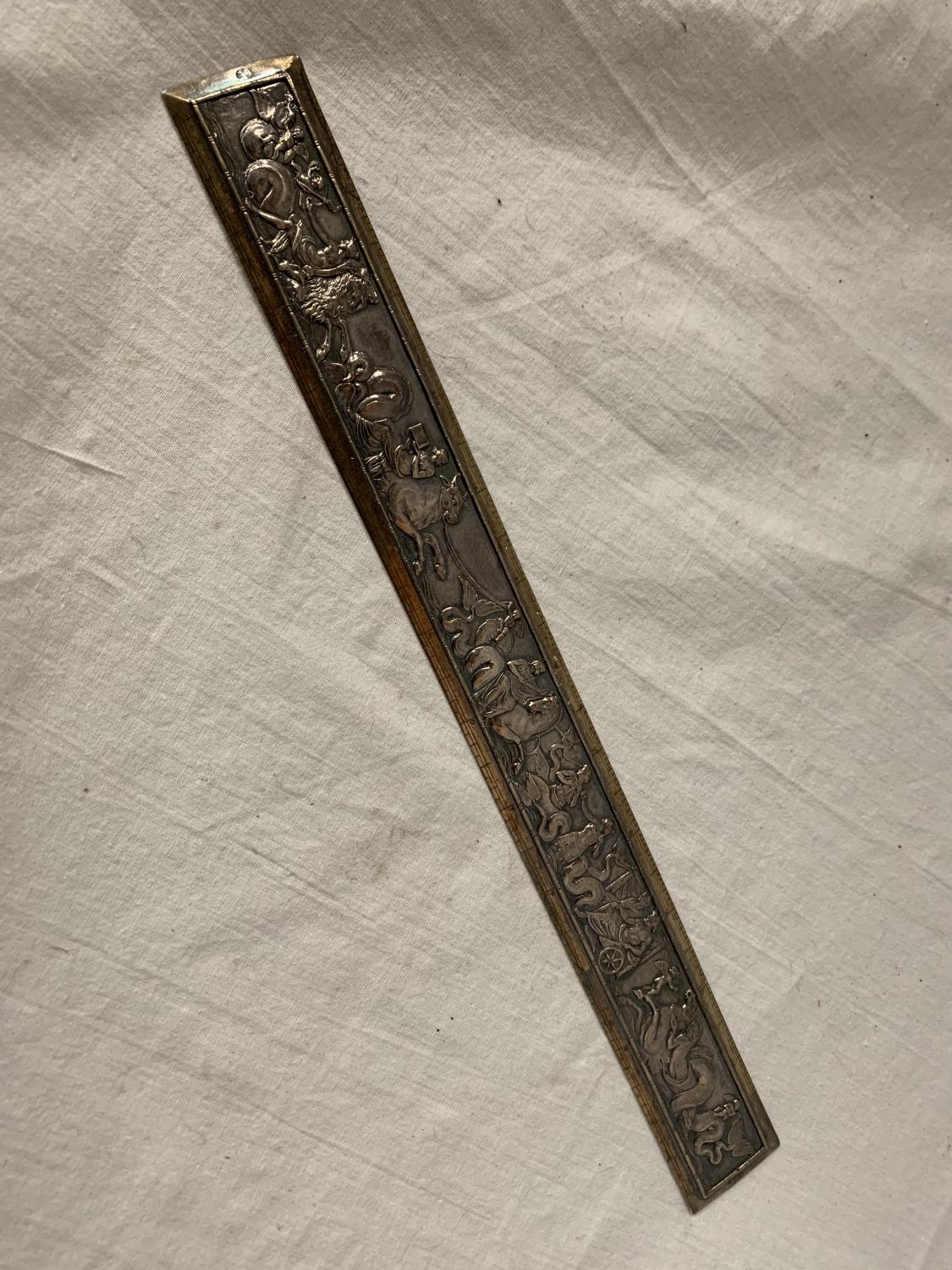 A DECORATIVE ELECTROPLATED TWELVE INCH RULER