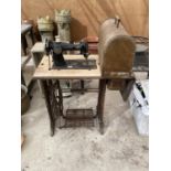 A SINGER TREADLE SEWING MACHINE AND A FURTHER VINTAGE SINGER SEWING MACHINE