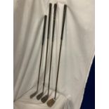 FOUR VINTAGE GOLF CLUBS