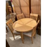 A MODERN CIRCULAR DINING TABLE 42" DIAMETER AND FOUR DINING CHAIRS