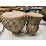 A POTTERY AND HIDE BONGO DRUM DUO