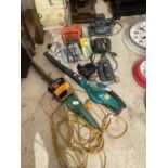 AN ASSORTMENT OF POWER TOOLS TO INCLUDE A HEDGE CUTTER, A LEAF BLOWER AND A SANDER ETC