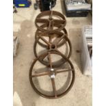 A GROUP OF FOUR VINTAGE TRAIN WHEELS
