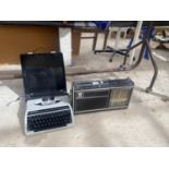 A SILVER REED TYPE WRITER AND A GRUNDIG CONCERT-BOY 1100 RADIO