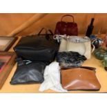 A COLLECTION OF DESIGNER HANDBAGS TO INCLUDE PRADA, OSPREY, RALPH LAUREN ETC