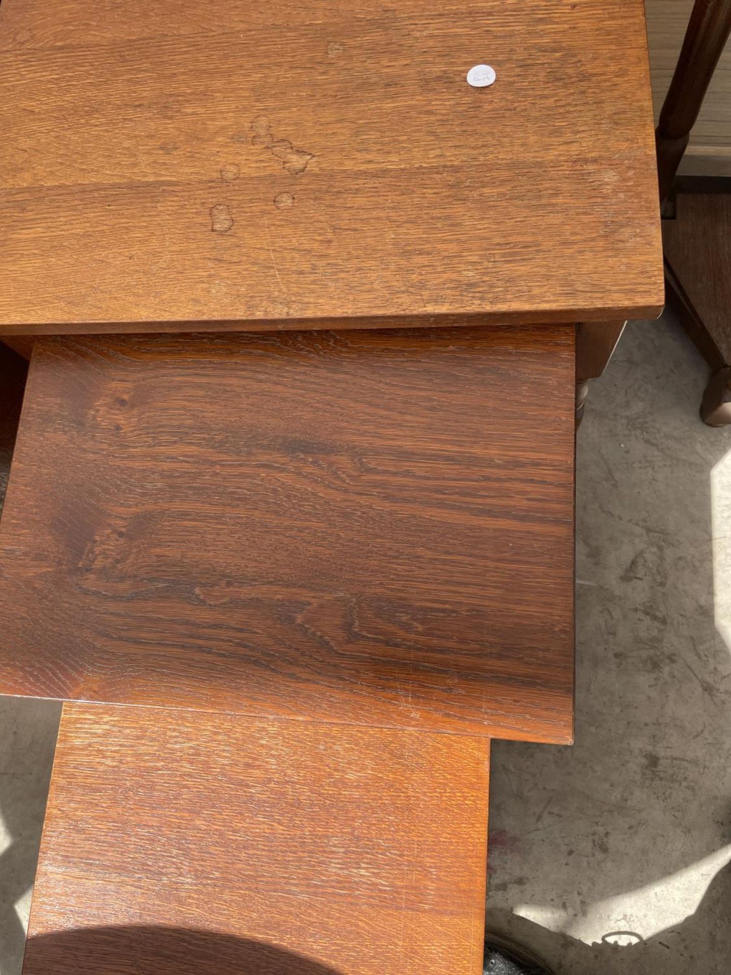 A NEST OF THREE OAK TABLES AND SMALL DRAWER CHEST - Image 3 of 4
