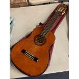 A VALENCIA HALF SIZED ACOUSTIC GUITAR