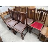 A SET OF FOUR OAK EARLY 20TH CENTURY DINING CHAIRS AND THREE SIMILAR CHAIRS