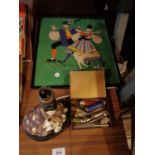 A FRAMED FELT FOLK PICTURE, AN ORIENTAL STYLE LAMP AND A TIN OF VINTAGE PEN KNIVES