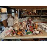 A LARGE COLLECTION OF DECORATIVE DOLLS OF VARIOUS NATIONALITIES