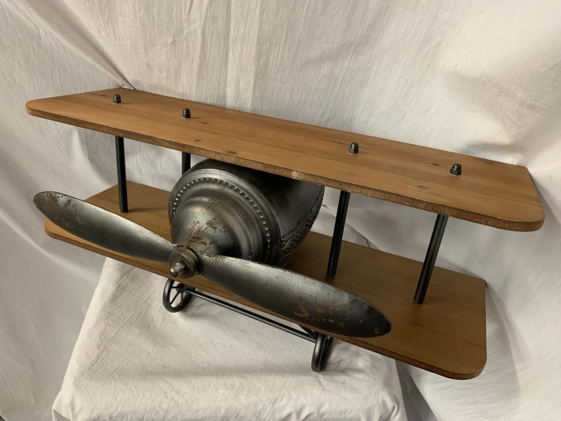 A WALL SHELF IN THE FORM OF A VINTAGE AEROPLANE WIDTH: 60CM