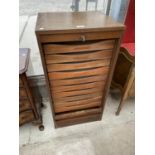 A MID 20TH CENTURY 'ABBESS' FILING CABINET/SAFE WITH TEN DRAWERS AND PLAIN ROLLER FRONT WITH WORKING