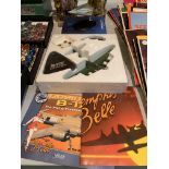 A NEW AND BOXED DIE CAST MEMPHIS BELLE TO INCLUDE A DISPLAY PLINTH AND A STAR TREK SPACESHIP ON A