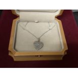 A 15 CARAT WHITE AND YELLOW GOLD DIAMOND HEART CLUSTER PENDANT WITH CHAIN LENGTH 44CM