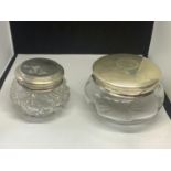 TWO HALLMARKED SILVER TOPPED LIDDED POWDER POTS