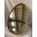 AN OVAL WALL MIRROR WITH A BRASS ROPE DESIGN FRAME L: APPROXIMATELY 60CM