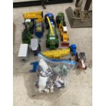 AN ASSORTMENT OF FARM VEHICLES AND TOYS