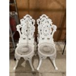 A SET OF FOUR PAINTED ALUMINIUM BISTRO CHAIRS