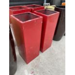 A PAIR OF RED SQUARE FIBRE GLASS PLANTERS (H:90CM)