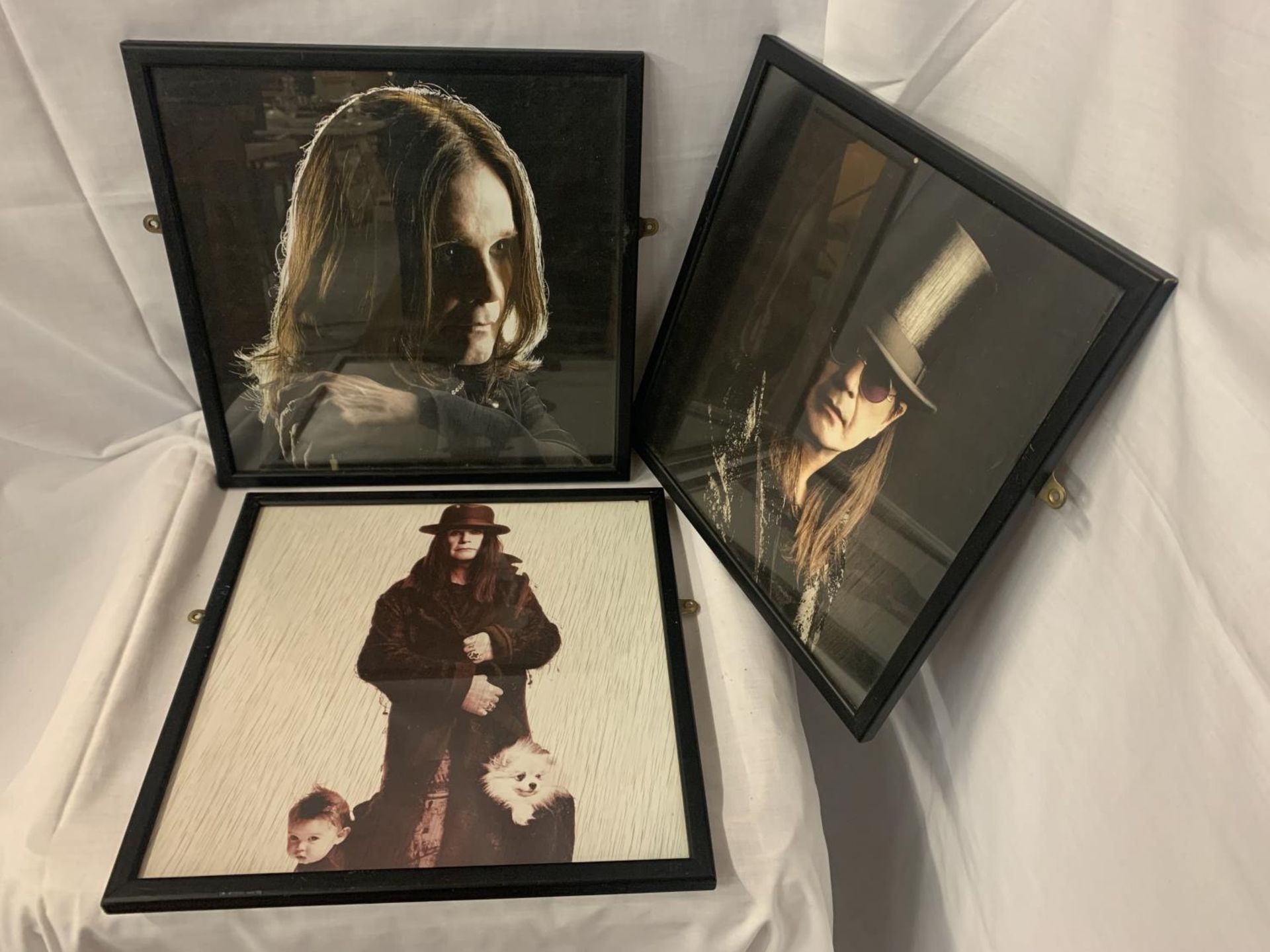 THREE FRAMED PICTURES OF OZZY OSBOURNE