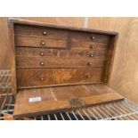 A SMALL VINTAGE M&W WATCH MAKER/ENGINEER'S TOOL CHEST ENCLOSING FOUR SHORT AND THREE LONG DRAWERS