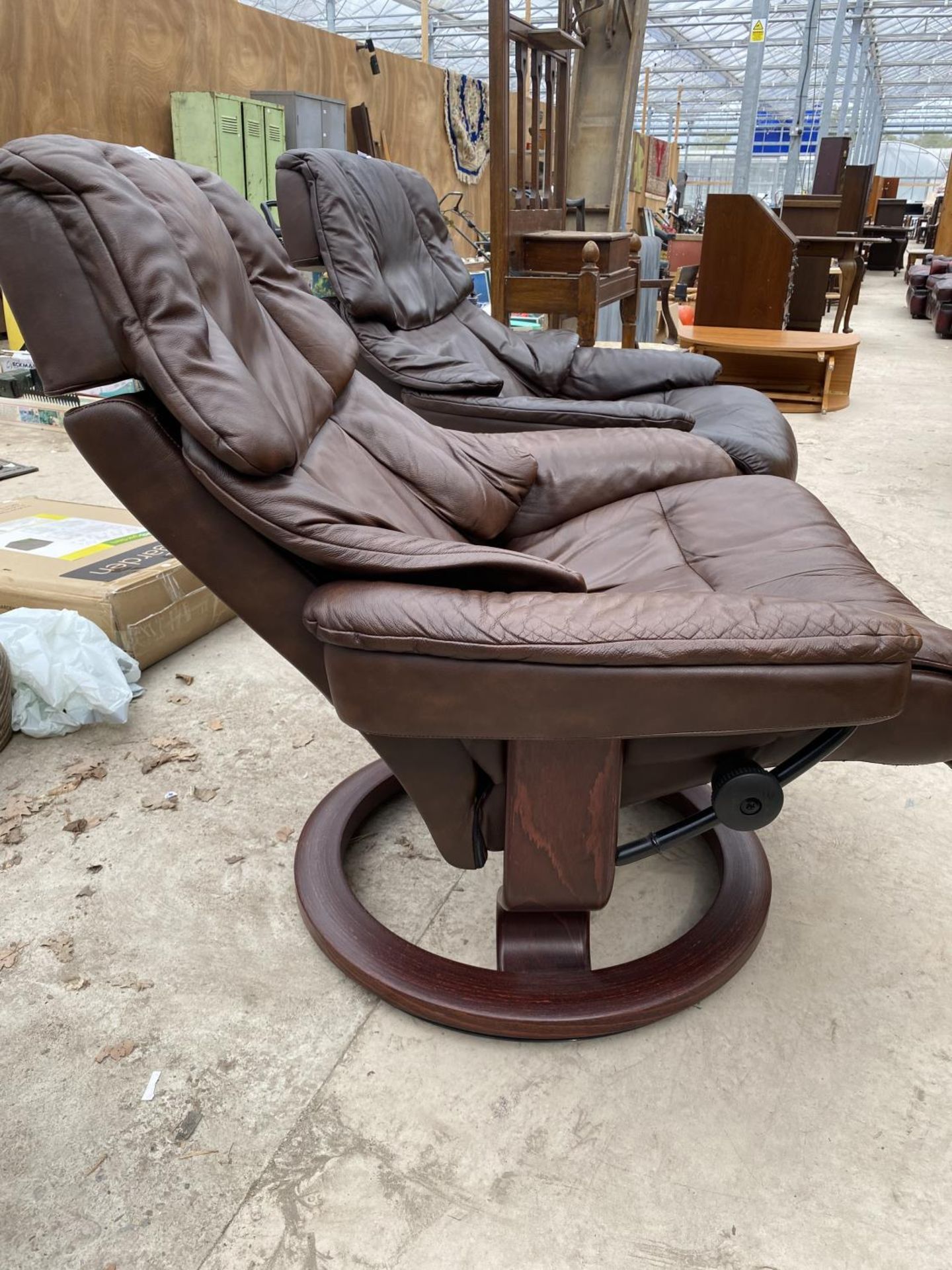 A STRESSLESS RECLINING CHAIR