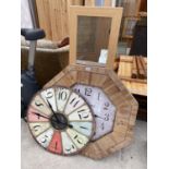 TWO LARGE CLOCKS AND A WOODEN FRAMED MIRROR