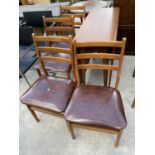 A RETRO TEAK DROP-LAF DINING TABLE AND FOUR CHAIRS