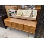 A RETRO TEAK AUSTINSUITE DRESSING TABLE WITH SIX DRAWERS, 61" WIDE