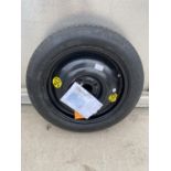 A FOUR STUD FORD WHEEL WITH AS NEW MICHELIN TYRE T125/80/R15