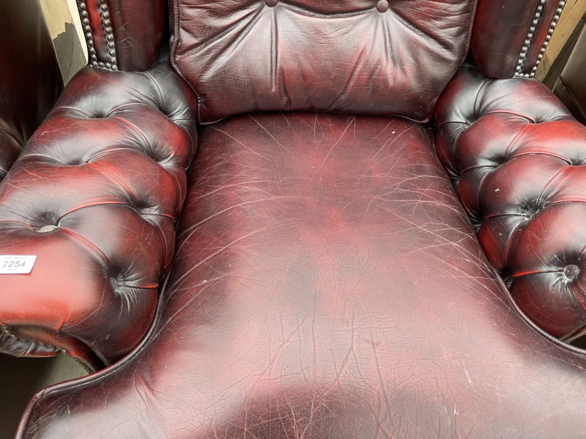 TWO OXBLOOD LEATHER ARMCHAIRS WITH BUTTONED BACK AND ARMS - Image 3 of 7