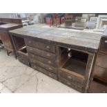 A LARGE WORK BENCH ENCLOSING NINE DRAWERS WITH SCOOP HANDLE, 77" WIDE, 25" DEEP