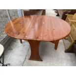 A MODERN PINE DROP-LEAF DINING TABLE, 45X56"