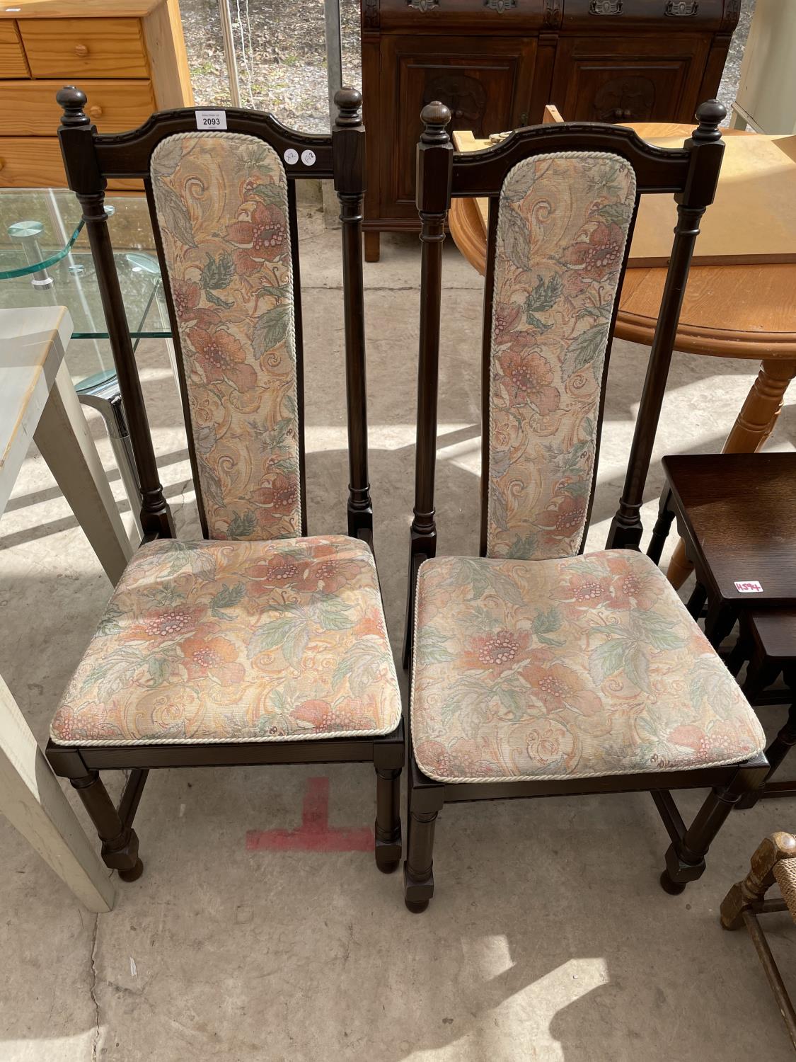 A PAIR OF ERCOL DINING CHAIRS WITH UPHOLSTERED SEATS AND BACKS