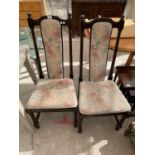 A PAIR OF ERCOL DINING CHAIRS WITH UPHOLSTERED SEATS AND BACKS