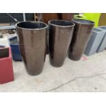 THREE ROUND BROWN FIBRE GLASS PLANTERS (H:93CM)