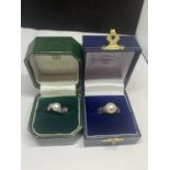 TWO MARKED 925 SILVER RINGS WITH SIMULATED PEARLS ONE SIZE L AND ONE L/M IN PRESENTATION BOXES