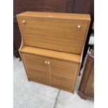 A RETRO TEAK SCHREIBER BUREAU, 33.5" WIDE