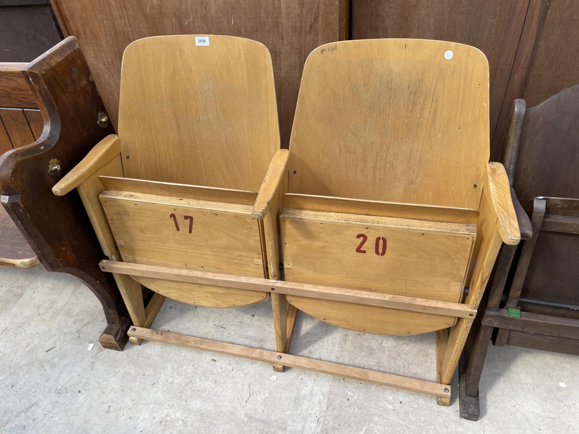 A PAIR OF CINEMA FOLDING SEATS, NUMBERS 17 AND 20