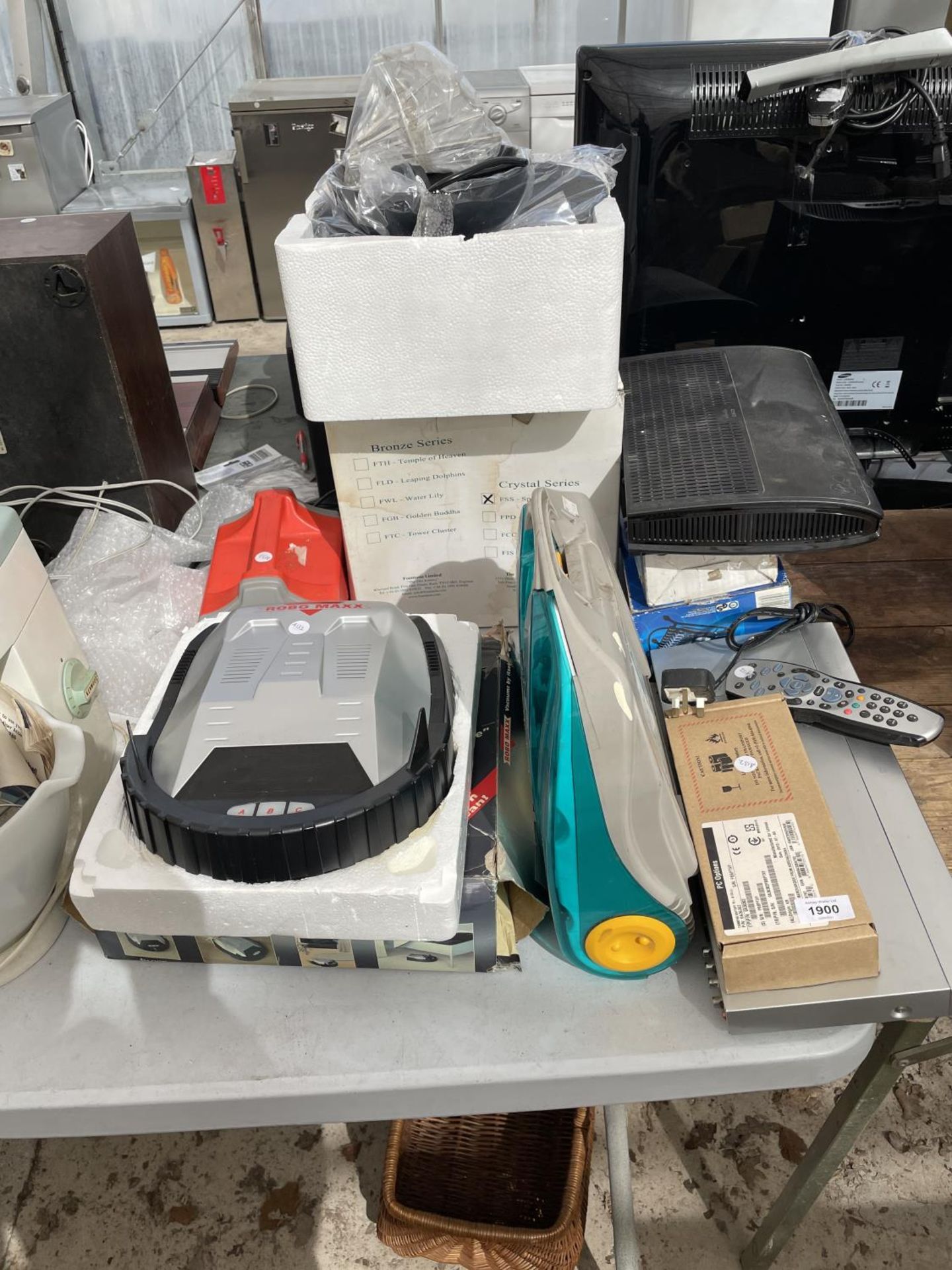 AN ASSORTMENT OF ITEMS TO INCLUDE A ROBO MAXX VACUUM CLEANER, A JVC DVD PLAYER AND A VIRGIN MEDIA