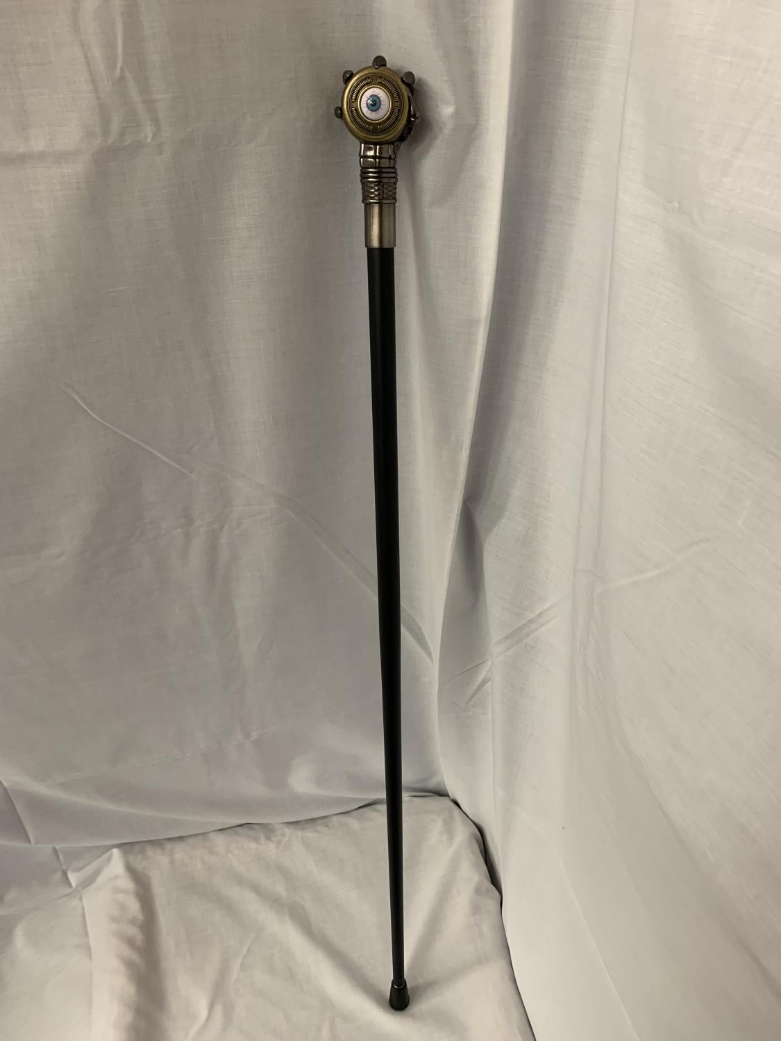 A BALL AND CLAW HANDLE WALKING STICK