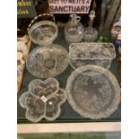 A SELECTION OF GLASS SERVING DISHES, ONE WITH SILVER COLOURED HANDLE, DECANTER AND GLASS FLAGON