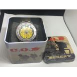 A C.O.D.DESSERT WRISTWATCH IN A PRESENTATION TIN