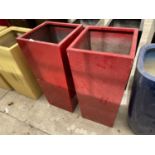 A PAIR OF RED SQUARE FIBRE GLASS PLANTERS (H:90CM)