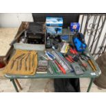 AN ASSORTMENT OF TOOLS TO INCLUDE DRILL BITS, TORCHES AND A WOOD PLANE ETC