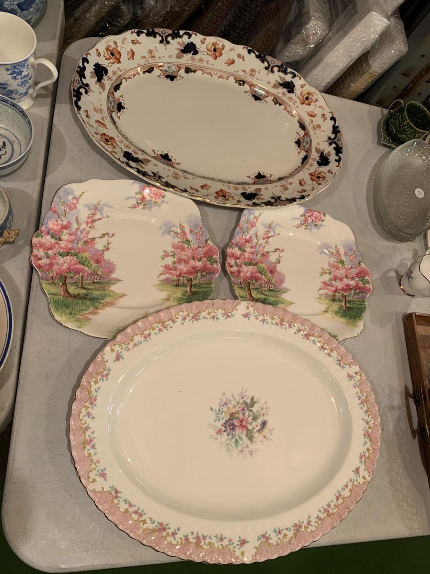 TWO SERVING PLATES ONE BEING A ROYAL ALBERT SERENITY ROSE, THE OTHER IS LEIGHTON BY S HANCOCK & SONS