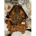 A LARGE CUCKOO CLOCK HEIGHT 40CM