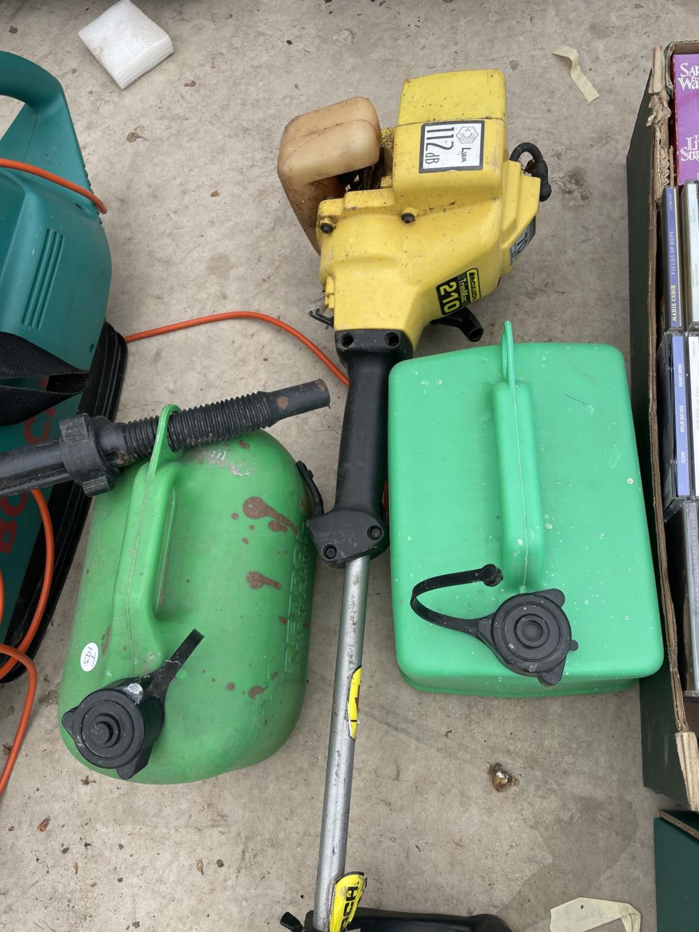 A LEAF BLOWER, TWO FUEL CANS AND A STRIMMER - Image 2 of 4