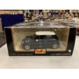 A BOXED 'MAISTO' 1:24 MINI COOPER DIE-CAST METAL CAR