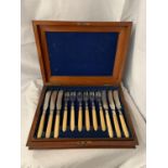 A VINTAGE MAHOGANY CANTEEN OF FLATWARE HEALY ENGRAVED WITH BARLEY TWIST HANDLES. SIX PLACE SETTING
